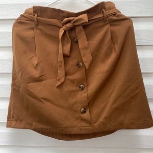 Cute blu pepper, Caramel brown skirt with bottoms in front and tie!